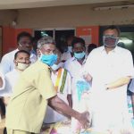 Mr Karti Chidambaram while distributing essential items to Keeramangalam Town Panchayat officials, sanitary workers and general public of Alangudi village.