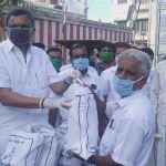 Mr. Karti Chidambaram while distributing essential items to the general public of the Yemaneswaram region of Paramakudi town.