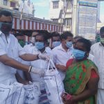 Mr. Karti Chidambaram while distributing essential items to the general public of the Yemaneswaram region of Paramakudi town.